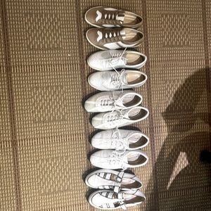 5 pairs of designer golf shoes